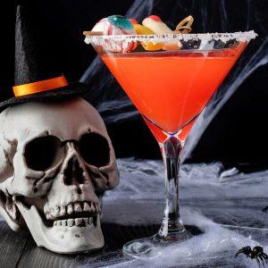 Spooky Halloween cocktail with pumpkin spice and garnish, perfect for your Halloween party