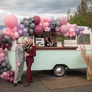 Happy guests at a wedding bar run by professional bartenders